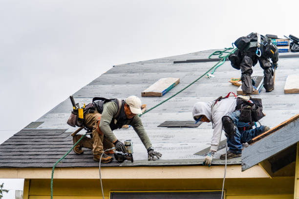 Professional Roof Replacement technician working in Fairmount, IN